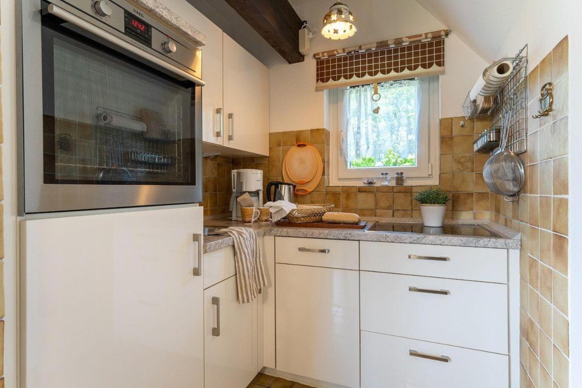 Am-Hohen-Ufer-Reetdach-Haus-Ocean-Breeze-136 Villa โกรสเซนโบรเดอ ภายนอก รูปภาพ